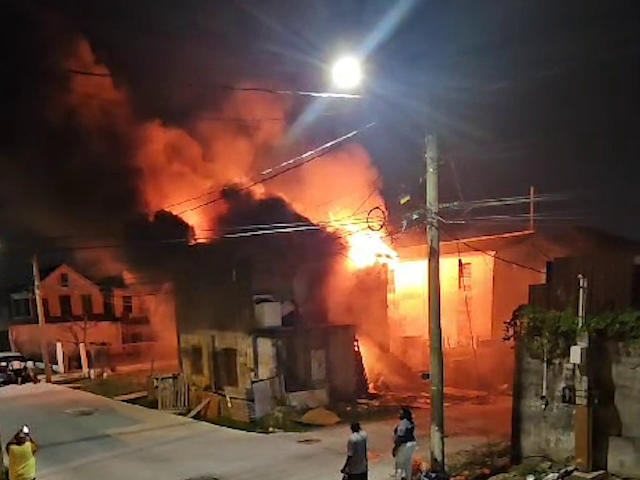 Family Picking Up The Pieces After Fire Claims Home   