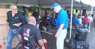 After Thirty Years on Crutches, Dad Gets New Wheelchair