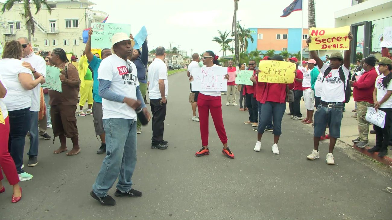 While Chang Confronts Crowd, Unions Stand Firm