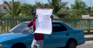 Belizean Artist Disrupts Traffic to Deliver a Defiant Message