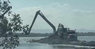 Placencia Demands Answers as Mystery Dredging Targets Sensitive Lagoon