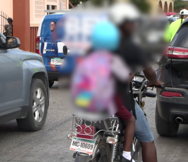 Clinging On: The Dangerous Reality of School Runs on Motorcycles