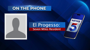 On the Phone: EL Progresso Seven Miles Resident